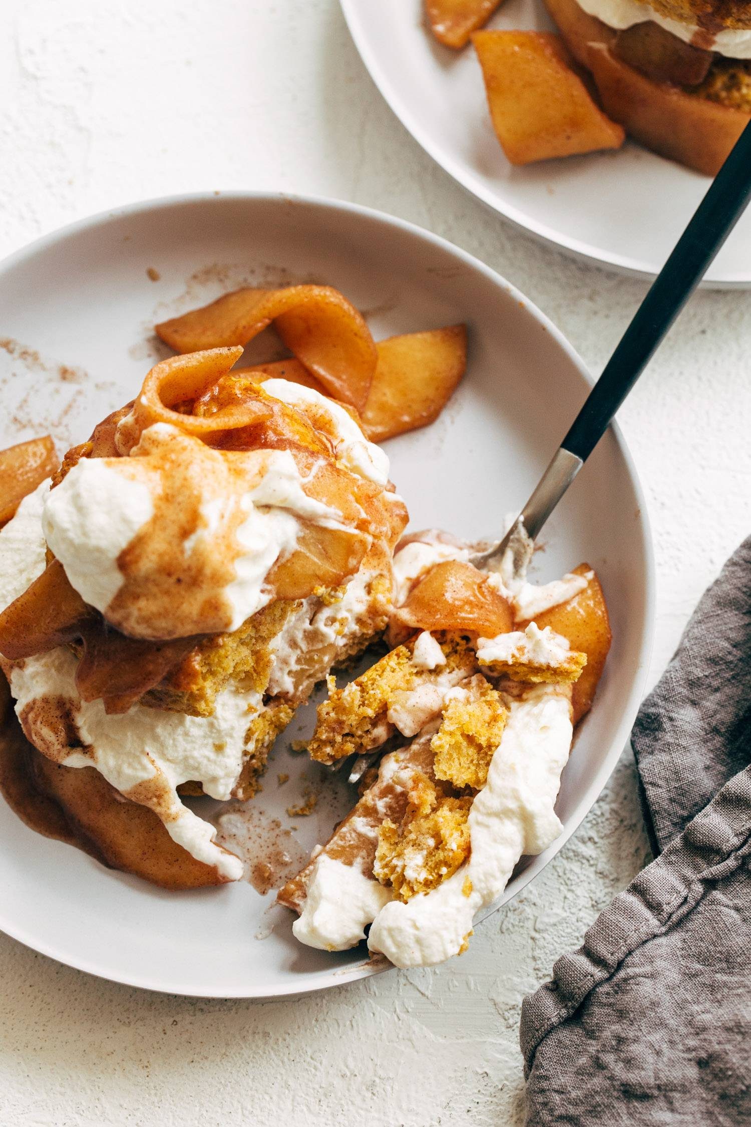 Taking a bite of pumpkin shortcakes.