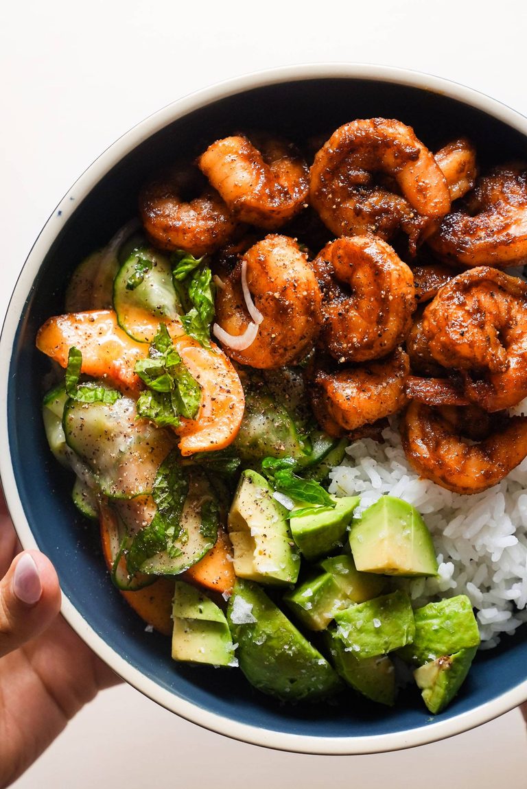 Spicy shrimp with peach salad and rice.
