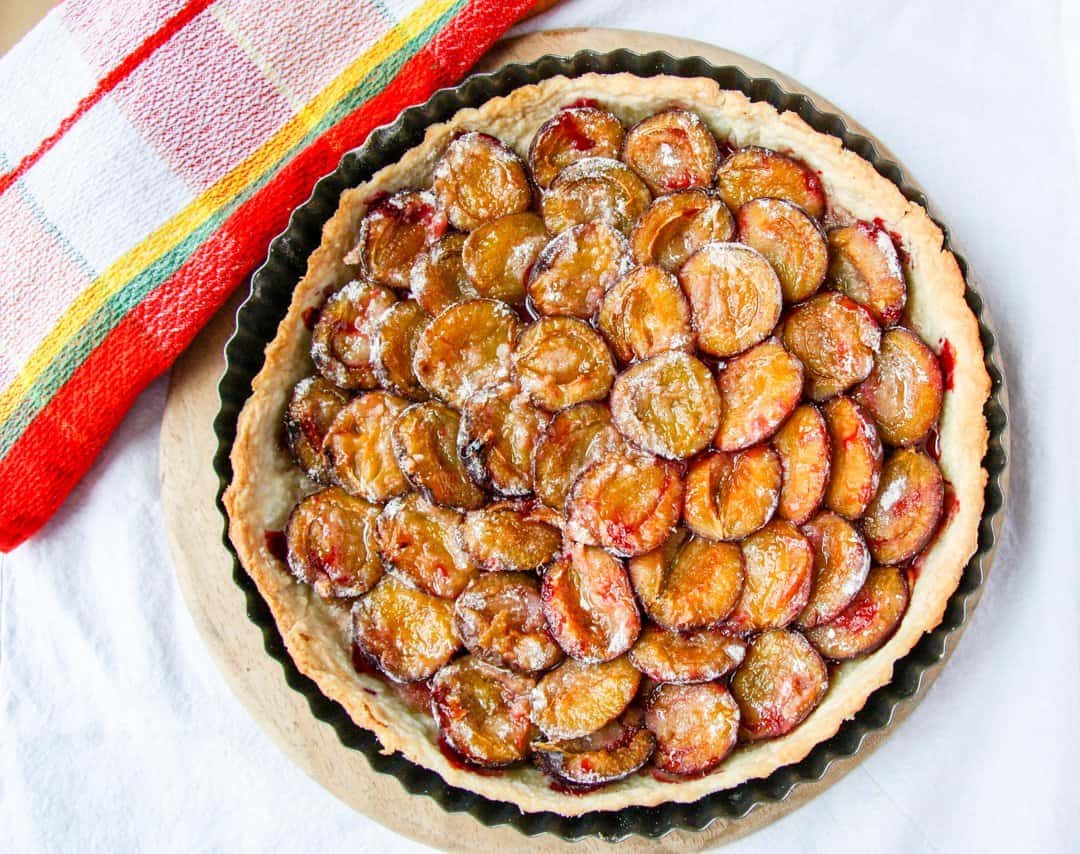 A plum tart on a table