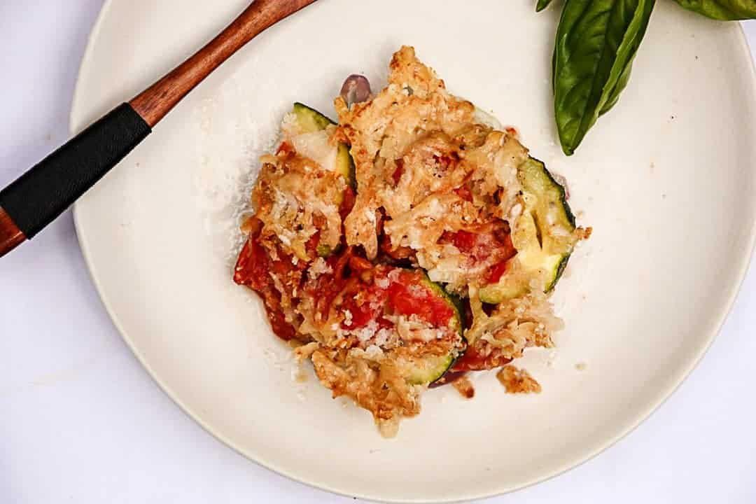 A slice of casserole on a plate