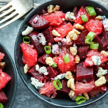 A bowl of salad, with Citrus and Beets