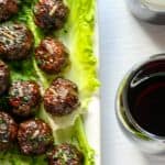 A plate of food and a glass of wine