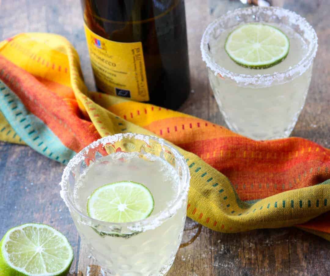 Two margaritas and a bottle of Prosecco