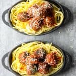 Two bowls of spaghetti and meatballs