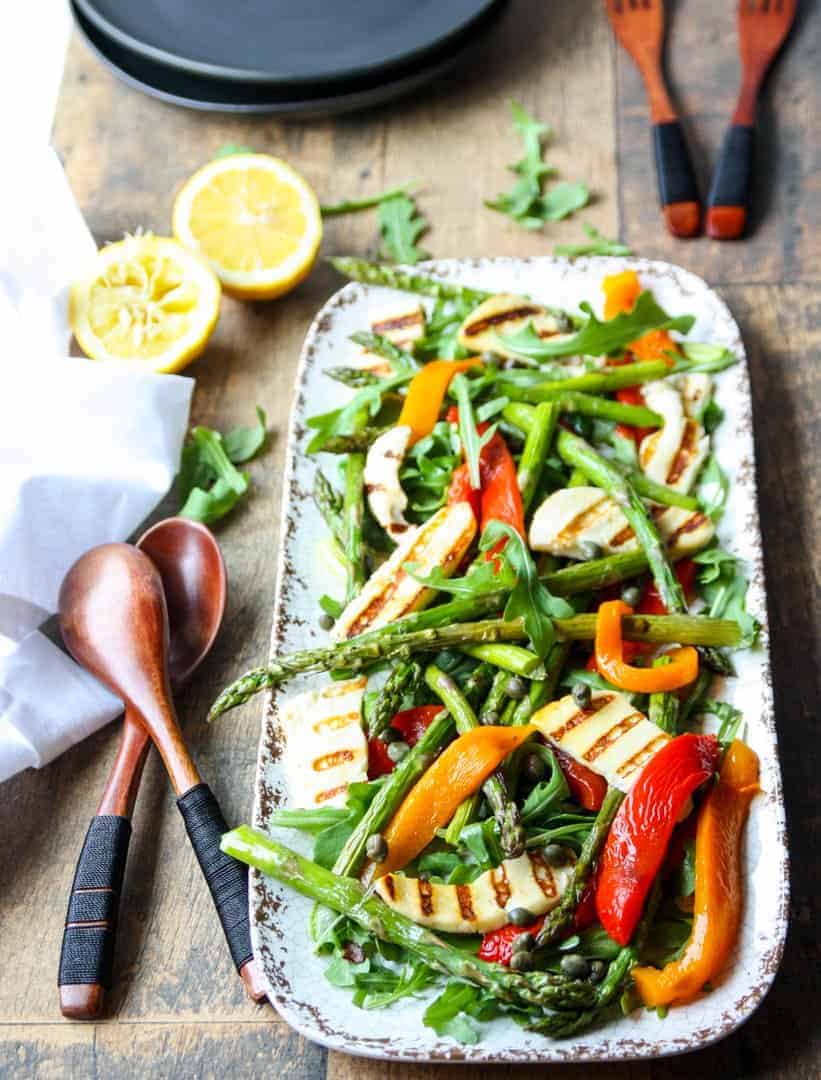 A close up of food on a table, with Halloumi and Salad