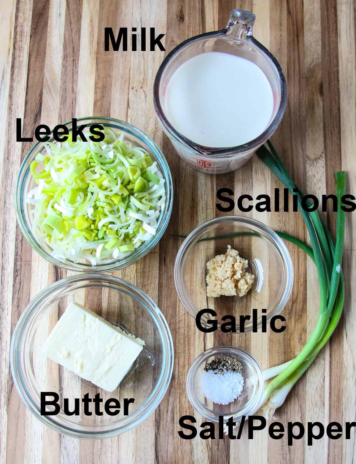 More recipe ingredients on a wooden board.