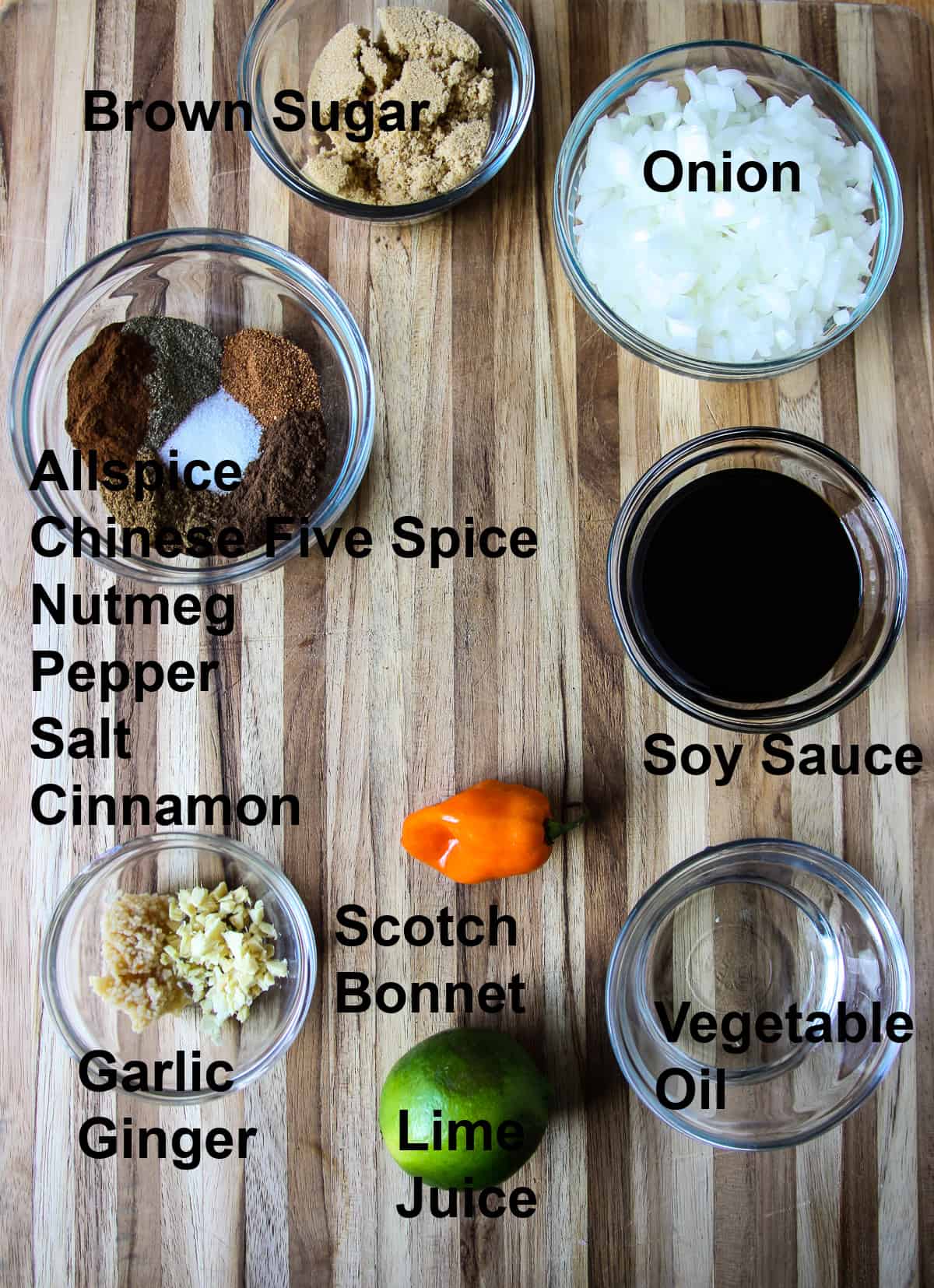 Ingredients for the marinade on a wooden board.