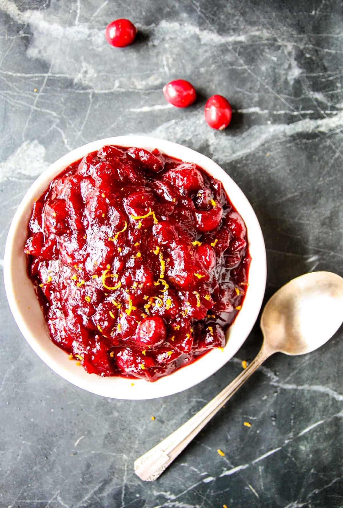 The cooled and thickened grand marnier cranberry sauce in a serving dish.