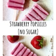 Strawberries and popsicles on a plate.