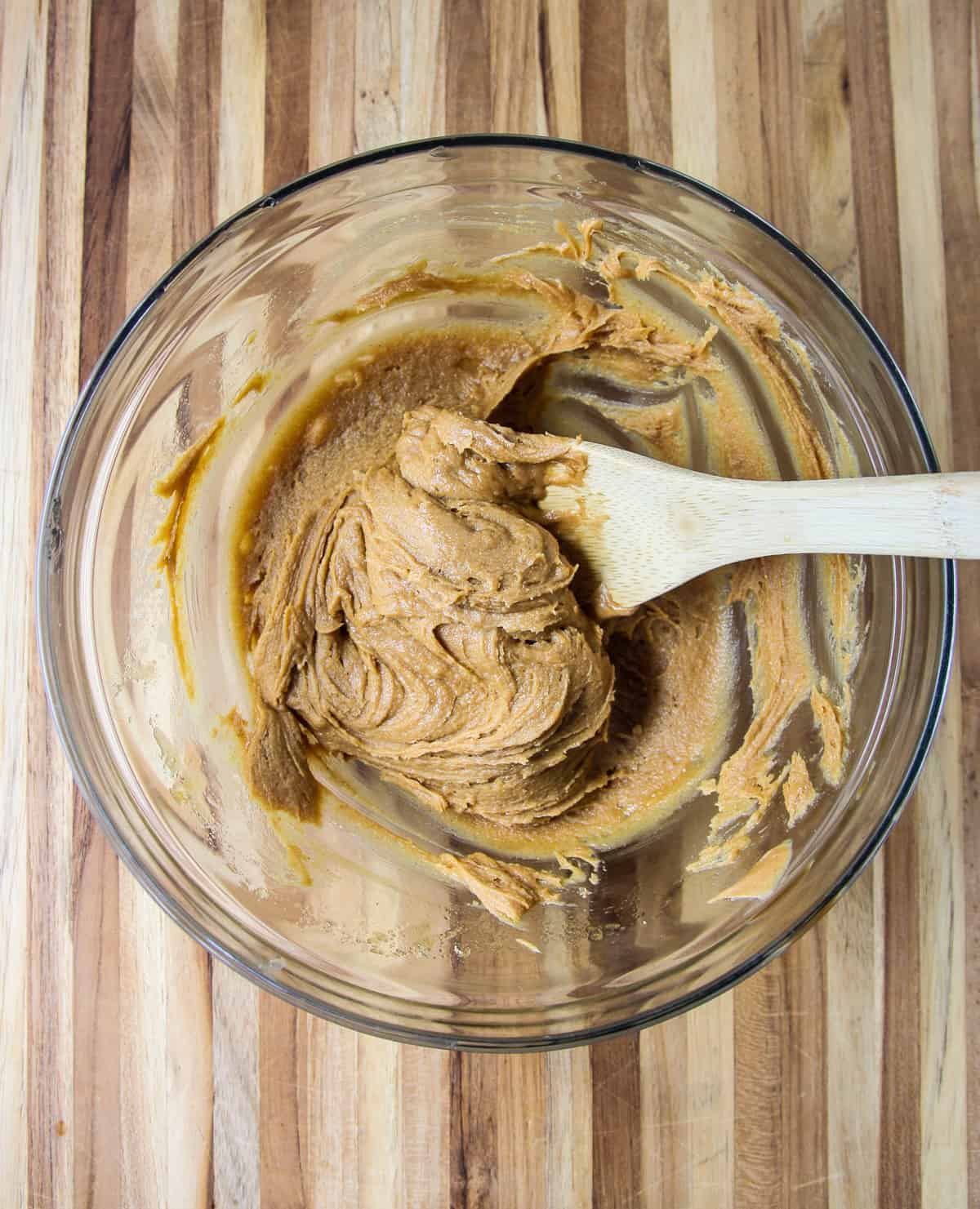 The ingredients combined in a glass mixing bowl.