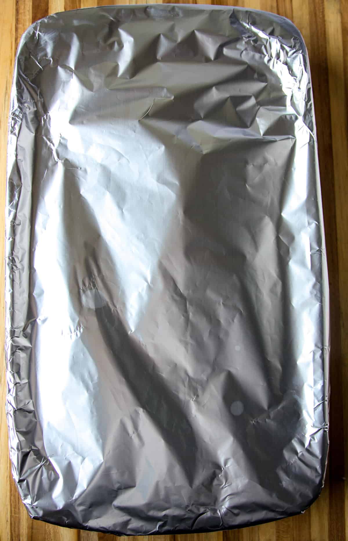 A foil covered baking dish.