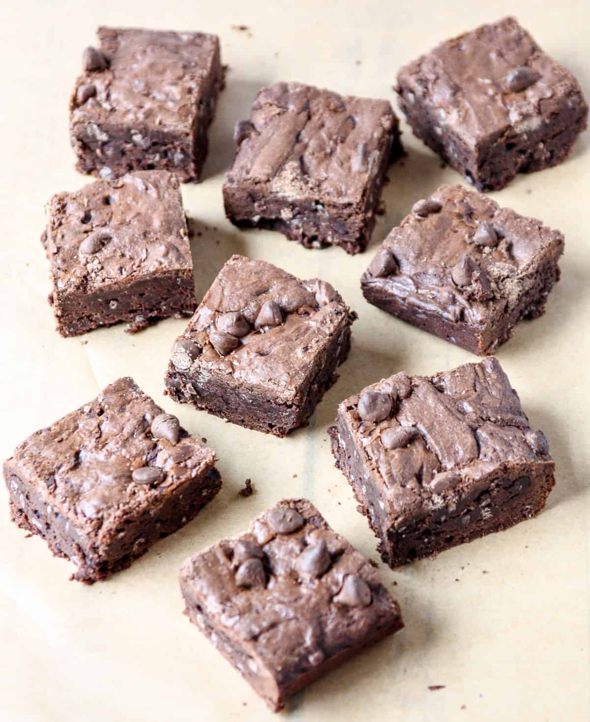 9 Mexican chocolate brownies on parchment paper.