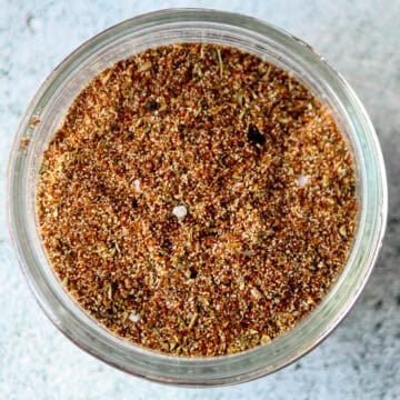Chicken taco seasoning mix in a glass jar.