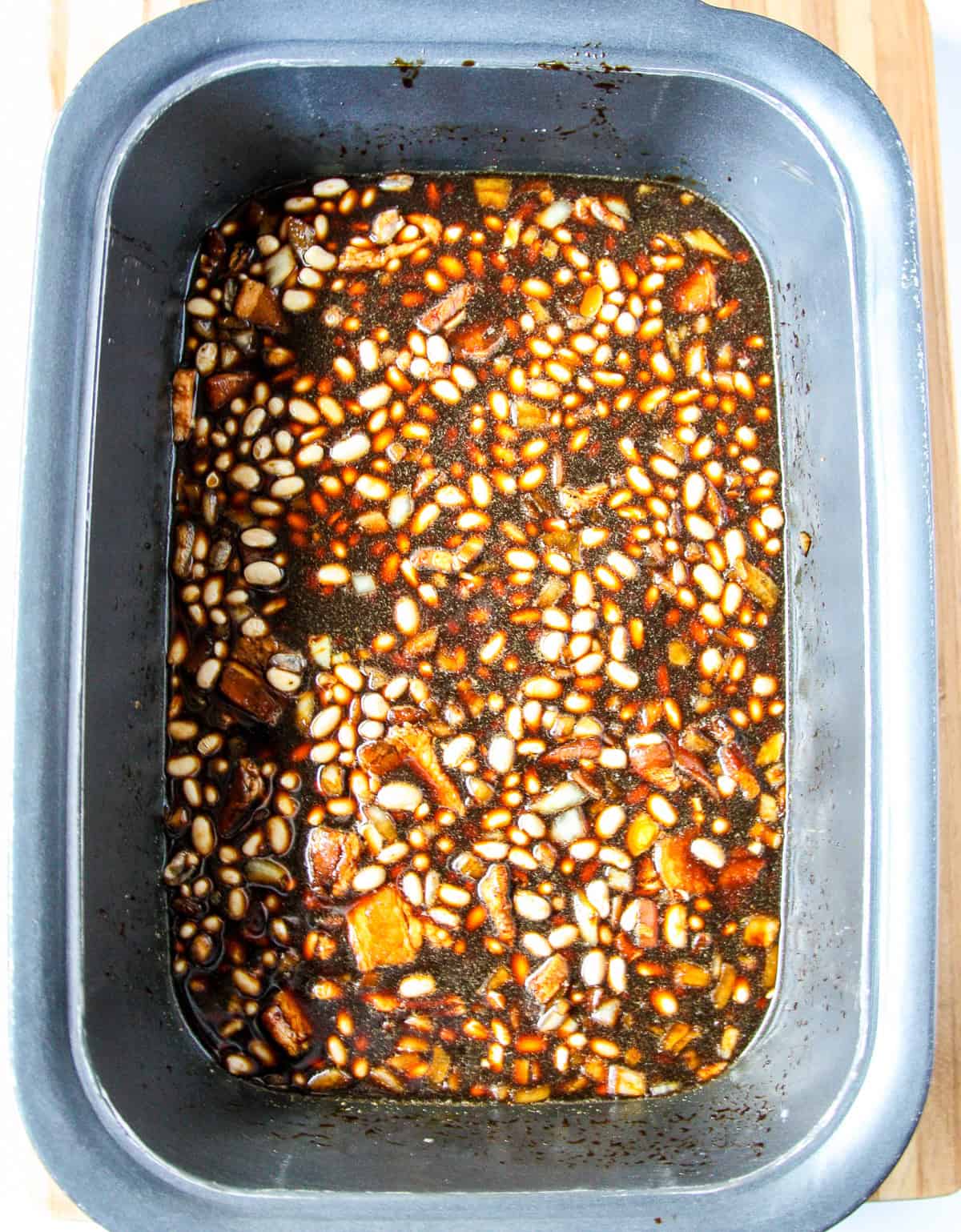 Recipe ingredients in the slow cooker before cooking.