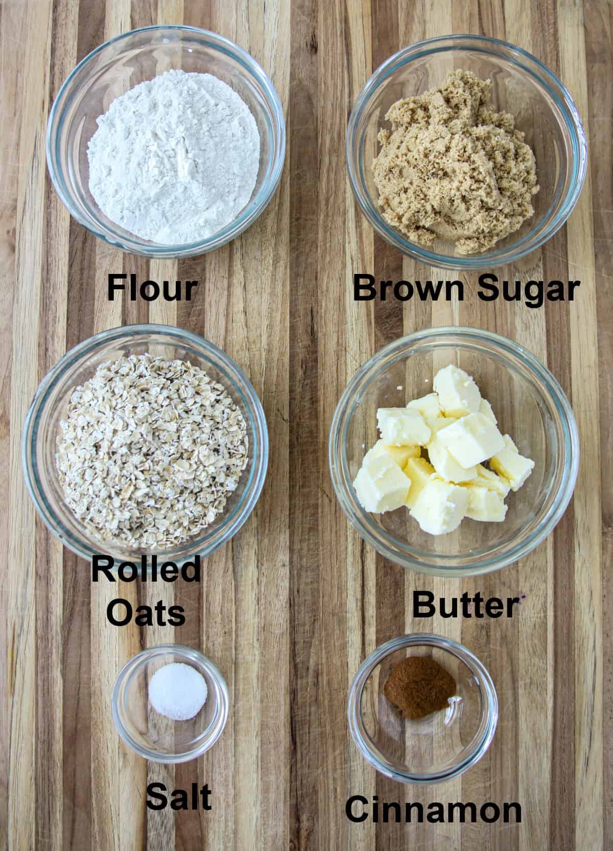 The ingredients for the crisp topping, in glass bowls.