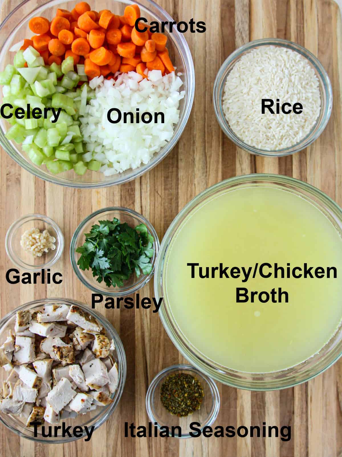 The ingredients for making this recipe in glass bowls on a wooden board.